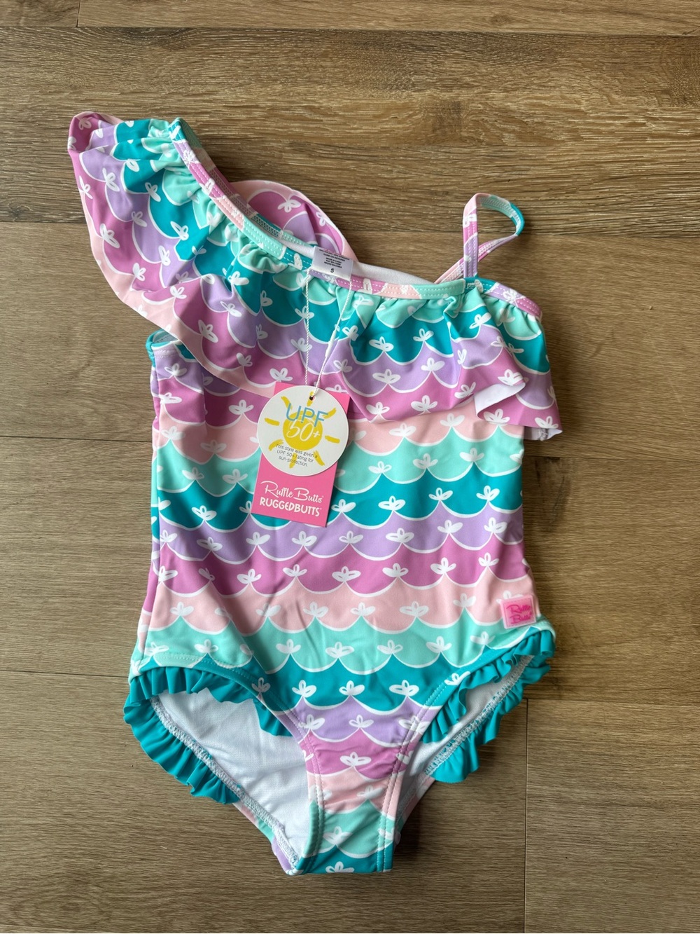 Ruffle Butts Pastel Stripe One-Shoulder Swimsuit in Pink, Purple & Teal Size 5T